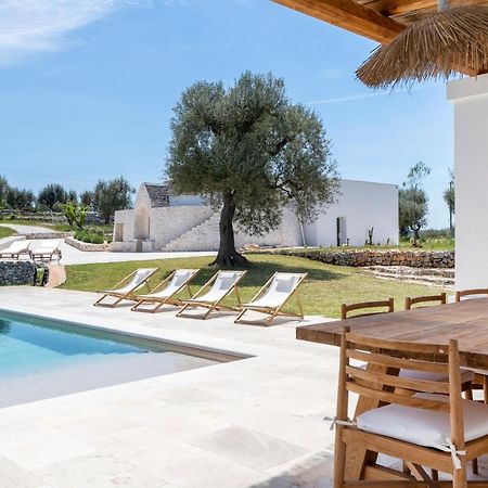 オストゥーニ Trulli Cicerali , Trulli Design Con Piscina Panoramicaヴィラ エクステリア 写真