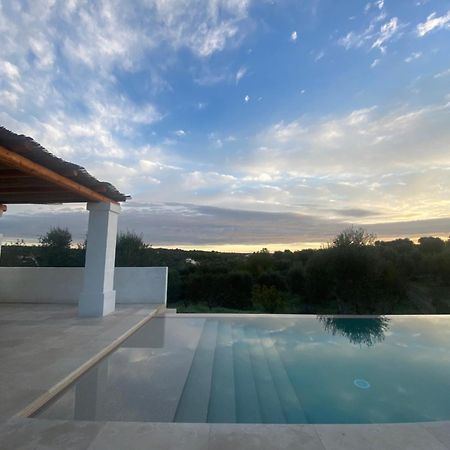 オストゥーニ Trulli Cicerali , Trulli Design Con Piscina Panoramicaヴィラ エクステリア 写真
