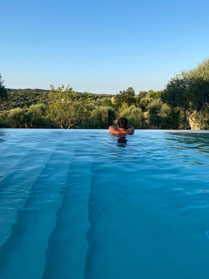 オストゥーニ Trulli Cicerali , Trulli Design Con Piscina Panoramicaヴィラ エクステリア 写真