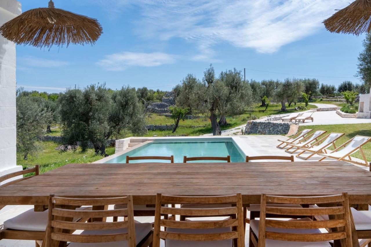 オストゥーニ Trulli Cicerali , Trulli Design Con Piscina Panoramicaヴィラ エクステリア 写真